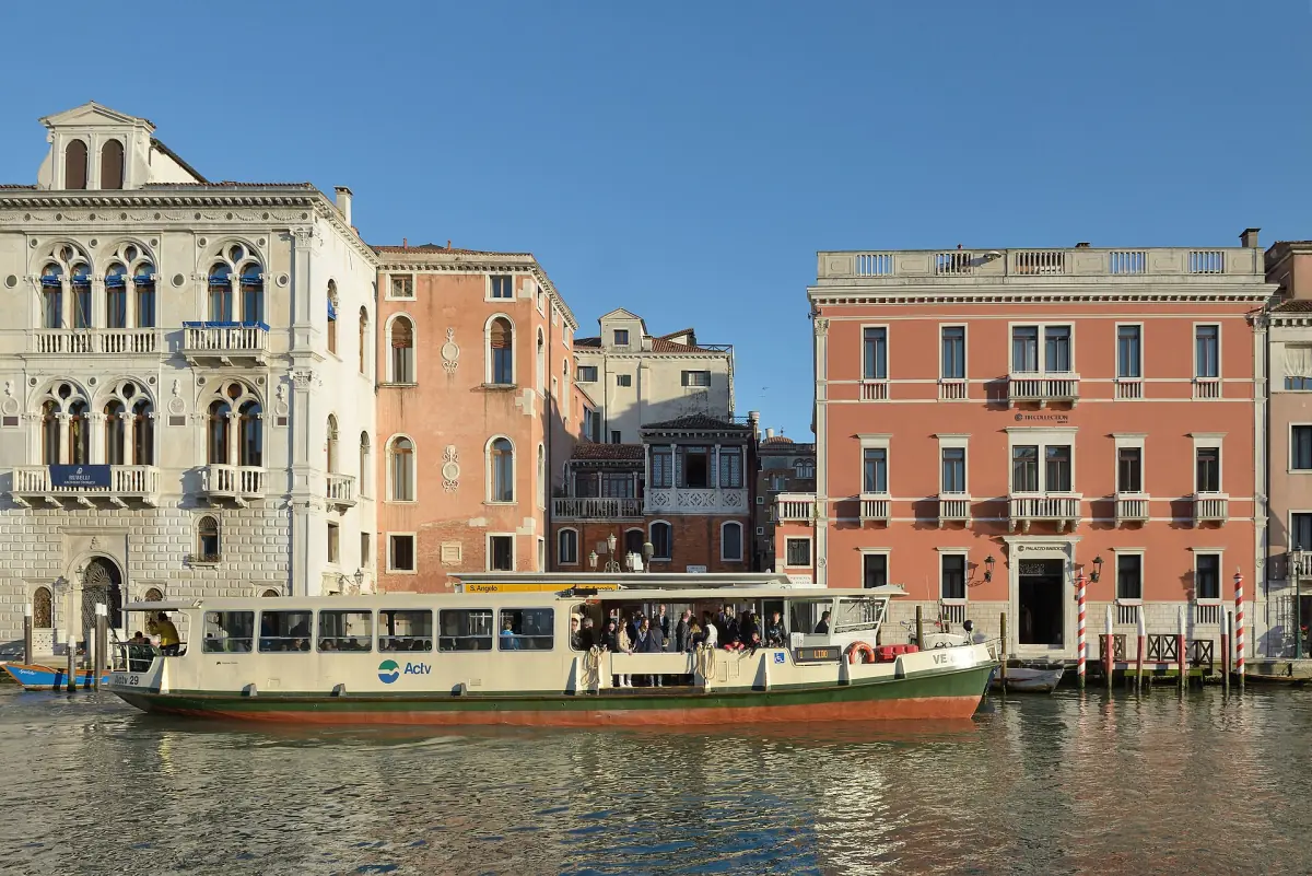 A vaporetto passing palazzi on the Grand Canal